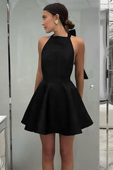 inostorâ„?Black high-waisted sleeveless halterneck dress