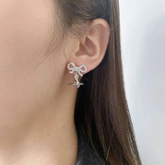 Bow 3D Saturn Orb Drop Stud Earring