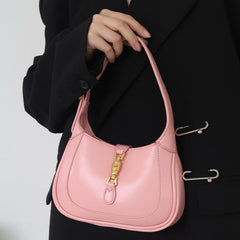 Pink Classic Curved Leather Handbag with Signature Buckle Closure